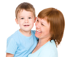 Image showing Portrait of a happy mother hugging her son