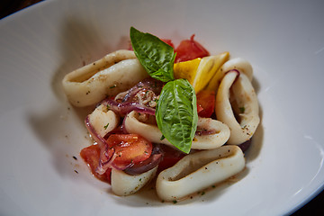 Image showing healthy rings squid salad with tomatoes