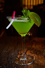 Image showing Martini glass with green cocktail