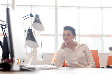 Image showing business woman working on computer at office