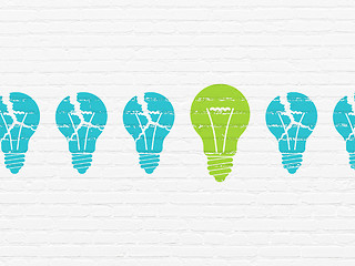 Image showing Business concept: light bulb icon on wall background