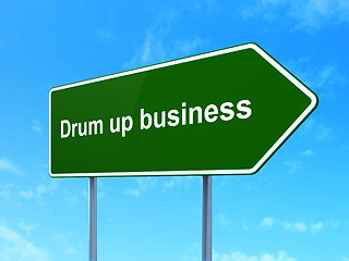 Image showing Finance concept: Drum up business on road sign background