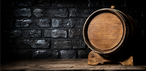 Image showing Wooden cask and bricks