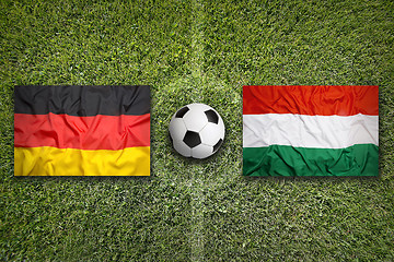 Image showing Germany vs. Hungary flags on soccer field