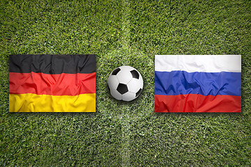 Image showing Germany vs. Russia flags on soccer field