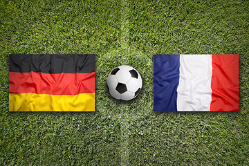 Image showing Germany vs. France flags on soccer field