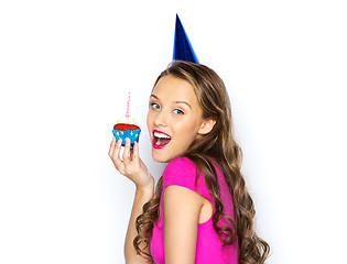 Image showing happy woman or teen girl with birthday cupcake