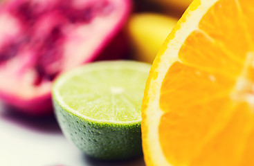 Image showing close up of fresh juicy orange and lime