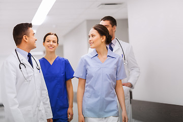 Image showing happy group of medics or doctors at hospital