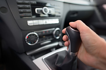 Image showing Driver shifting the gear stick