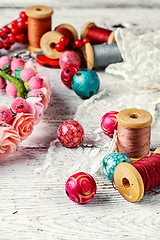 Image showing Beautiful beads and spool of thread
