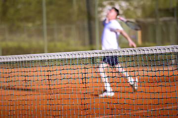 Image showing Tennis net Man plays tennis