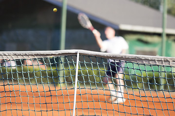 Image showing Tennis net Man plays tennis