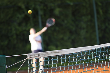 Image showing Tennis net Man plays tennis