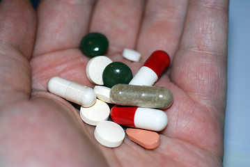 Image showing Handful of Pills