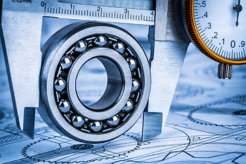 Image showing Ball bearings and Metal vernier caliper