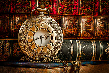 Image showing Old Books and Vintage pocket watch