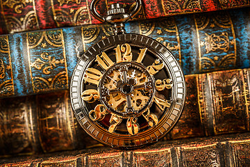 Image showing Old Books and Vintage pocket watch