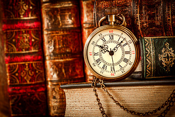Image showing Old Books and Vintage pocket watch