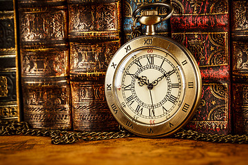 Image showing Old Books and Vintage pocket watch