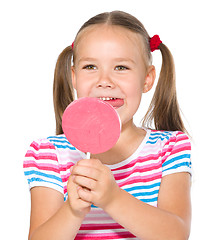 Image showing Little girl with lollipop