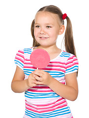 Image showing Little girl with lollipop