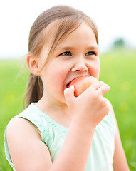 Image showing Portrait of a little girl with apple