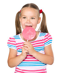 Image showing Little girl with lollipop