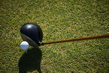 Image showing top view of golf club and ball in grass