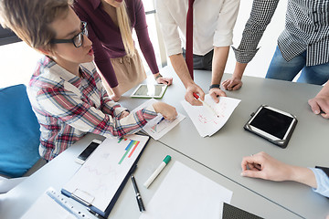 Image showing top  view of business people group brainstorming on meeting