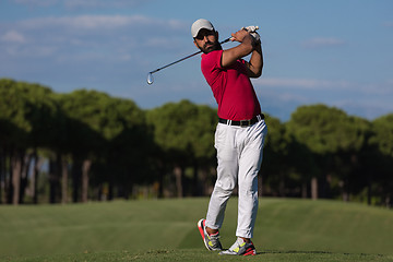 Image showing golf player hitting long shot