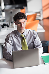 Image showing young business man  working on laptop  computer