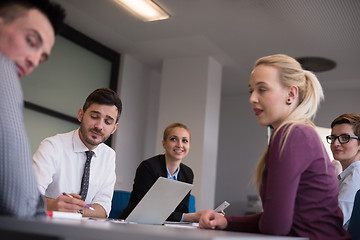 Image showing business people group on meeting at modern startup office