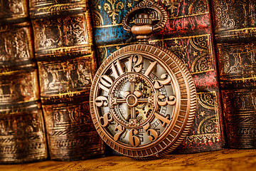 Image showing Old Books and Vintage pocket watch