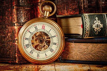 Image showing Old Books and Vintage pocket watch