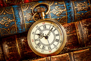 Image showing Old Books and Vintage pocket watch