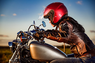 Image showing Biker girl on a motorcycle