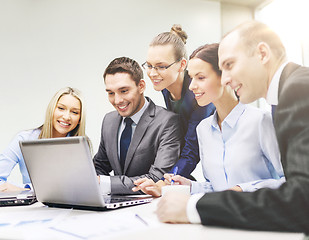 Image showing business team with laptop having discussion