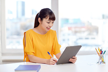 Image showing asian woman student with tablet pc at home