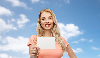 Image showing happy woman or teen girl with blank white paper