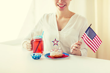 Image showing happy woman celebrating american independence day