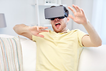 Image showing young man in virtual reality headset or 3d glasses