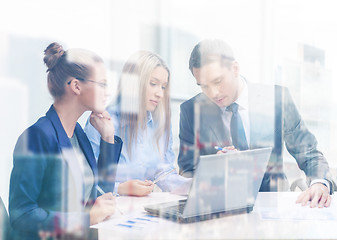 Image showing business team with laptop having discussion