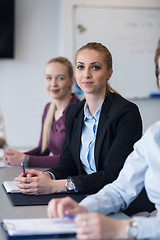 Image showing young business people group on team meeting at modern office