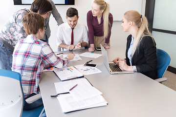 Image showing young business people group on meeting at modern office