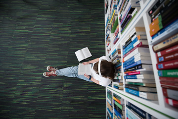 Image showing female student study in library