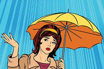 Image showing Beautiful sad girl in rain with umbrella, bad weather