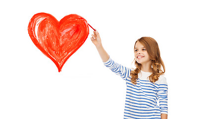 Image showing girl drawing big red heart in the air