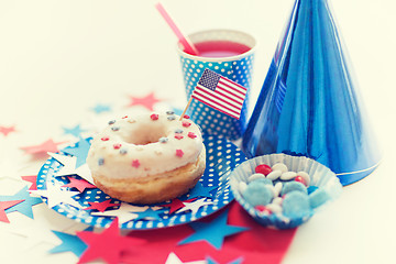 Image showing donut with juice and candies on independence day