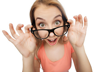 Image showing happy young woman or teenage girl in eyeglasses